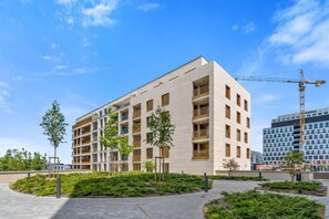 Step into a world of comfort with this stunning building facade, offering the perfect city escape.