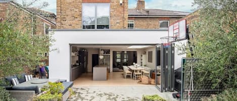 Wonderful fully opening patio doors on to the large garden.