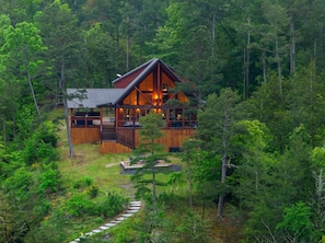 Our river cabin is nestled in the forest perched right over the river.