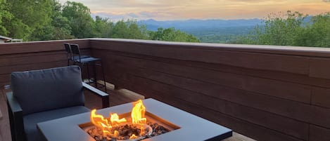 Fire table adds warmth and ambience to sunset views
