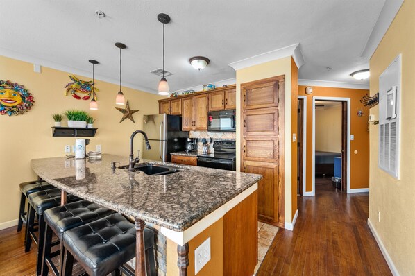 Large bar and full size kitchen