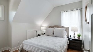 Simple elegance with plush bedding and peaceful ambiance.
