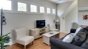 Natural light and soft tones create a calm, airy space.