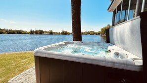 Hot Tub just feet away from the Lake!  220 Degree Views!