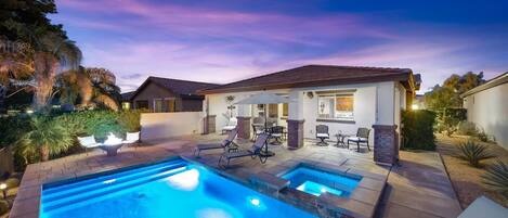 Large outdoor area.  Patio, pool, firepit, spa and grill.