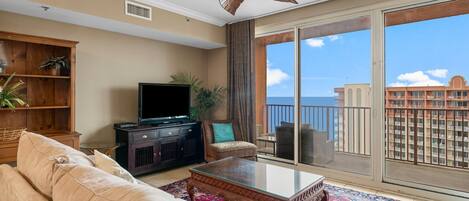 Gulf Front Living Area with Queen Size Sleeper Sofa, Flat Screen TV and Private Balcony Access