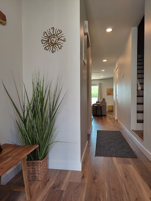 Inviting Foyer leads to spacious living area, patio and mountain views