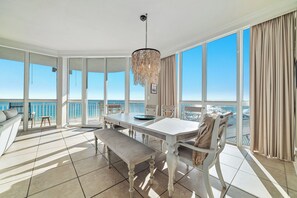 Large dining table overlooking the beautiful water!