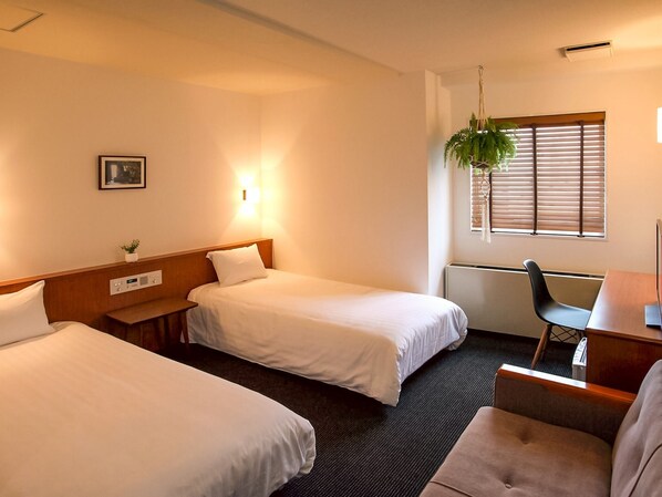 ・[Twin + Extra bed] 2 single beds are installed. Use of sofa bed for 3 people