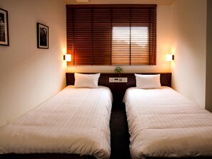 ・[Twin room] Interior with a simple and calm atmosphere
