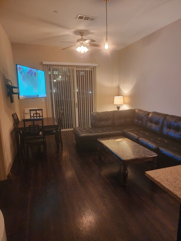 Spacious living room with view of downtown. Come enjoy a relaxing space.