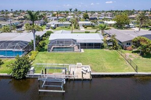Bird Eye View of Villa Del Aqua with Boat Dock and Lift