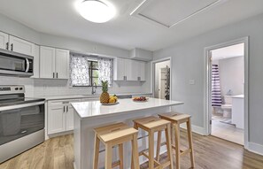 This cozy dining space seamlessly integrates into the kitchen, creating a convenient and inviting spot to enjoy your meals.