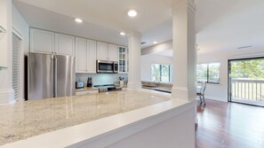 Fully Stocked Kitchen with Granite Countertops