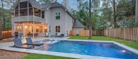 This is the epitome of indoor/outdoor living! Enjoy easy outdoor dining while taking in beautiful views of the backyard pool.