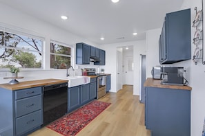 Modern kitchen with farmhouse sink.