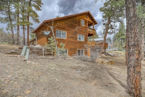 Rear of house with space to roam in backyard