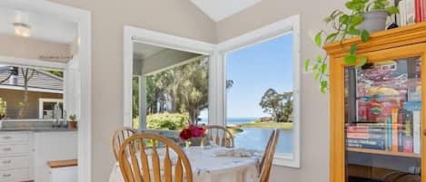 Take a deep breath, breathe in the fresh ocean air, and enjoy some quality time with your loved ones in this adorable ocean-view cottage.
