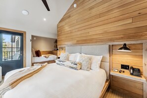 Suite Interior: King bed, day bed, 55” Smart TV, bluetooth speaker, humidifier,  seating areas
