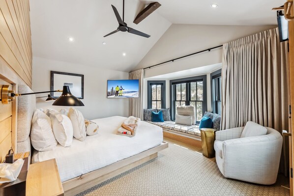 Suite Interior: King bed, day bed, 55” Smart TV, bluetooth speaker, humidifier,  seating areas