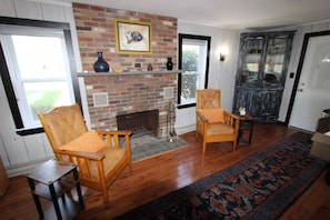 Living room seating with Decorative ( only) fireplace