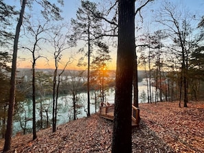 Experience Breathtaking sunrises/sunsets from our cabin right on the river! 