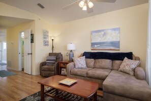 Comfortable and bright living space. Pull out sofa sleeps an additional 2 people. 