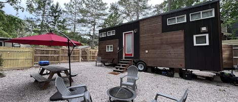 Fun tiny home with a great outdoor space, completely fenced in, fire pit, grill