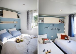 A welcoming bedroom with soft linens and charming decor, designed for restful nights.