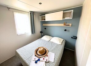 Cozy bedroom with soft bedding, ideal for a restful night's sleep after a day of exploration.