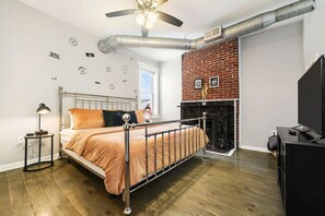 Unwind in this comfortable bedroom with a king-size bed.