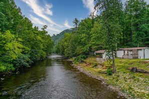 The cottage is located riverfront and has direct access to Little Pigeon River.