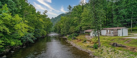 The cottage is located riverfront and has direct access to Little Pigeon River.