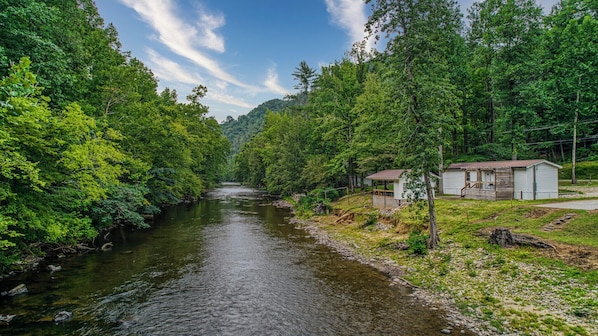 The cottage is located riverfront and has direct access to Little Pigeon River.