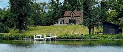 Cabin set back on the hill with great view of the lake. 