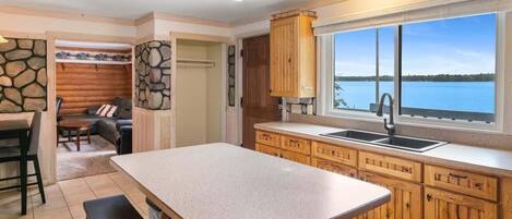 Large kitchen with room for the whole family, with a bonus view of the lake