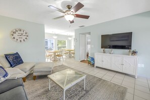 Living room opens to westerly facing patio, Siesta Key 2BR