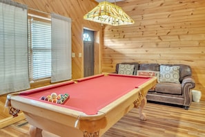 "Indoors","Furniture","Table","Couch","Pool Table"