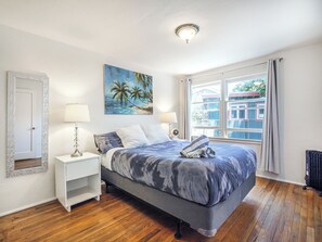 Second Bedroom with queen bed and plenty of light and blackout curtains