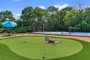 Who's up for a friendly game of mini golf? Let the good times roll!