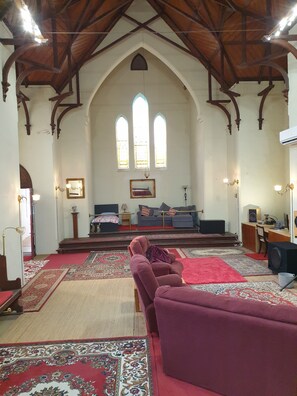 Lots of seating, extra area with second smart TV and dining table in church