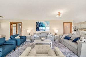 Modern main level open living area perfect for family gatherings!