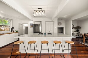Kitchen with city and ocean views (1)