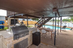 Covered Outdoor Sitting and Grilling Area