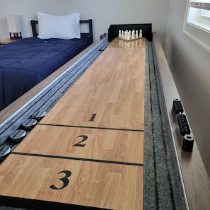 Play a game of shuffleboard with your guests