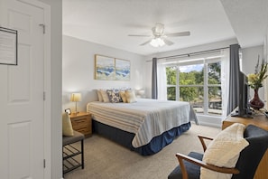 Sweet dreams and panoramic views in this cozy master bedroom