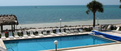 Balcony screened for comfort & has a great view of LRG, heated pool and beach