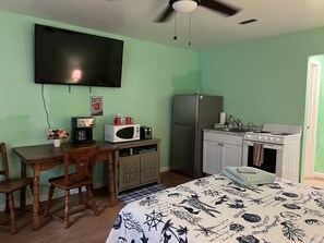Indoors, Screen, Microwave, Entertainment Center, Floor