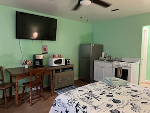 Indoors, Screen, Microwave, Entertainment Center, Floor