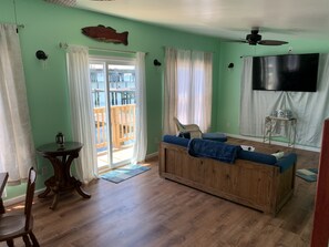 Indoors, Floor, Flooring, Furniture, Living Room